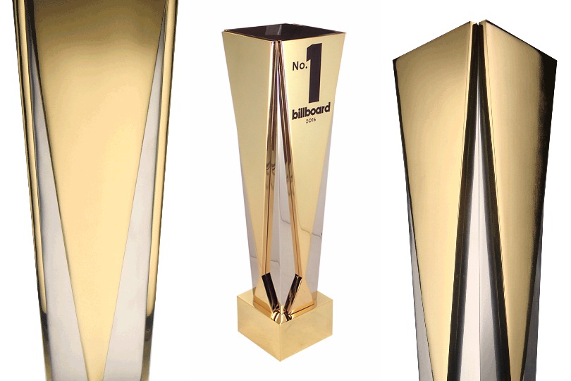3 views of the Gatsby Gold award, made of aluminum and 24k gold plating. Award is customized with the Billboard No.1 logo