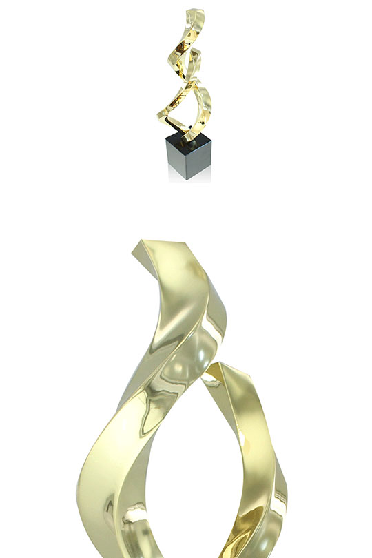 2 views of the limited edition Ribbons 1 trophy. Above view of the award and up-close of the top