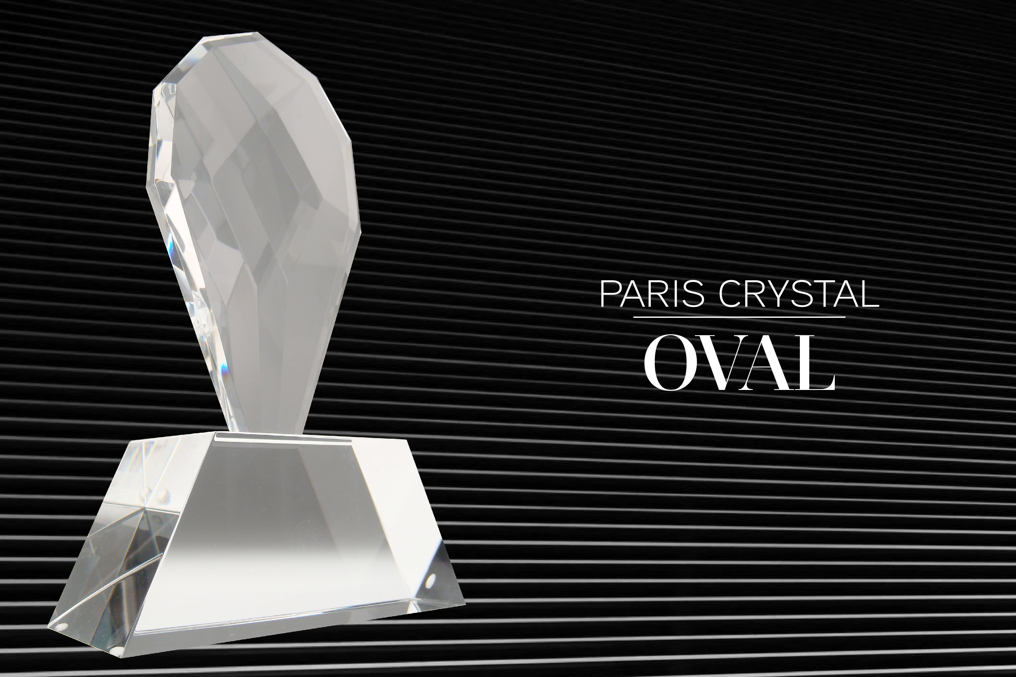 Oval shaped, faceted crystal oval trophy mounted on base